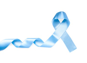 Photo of Light blue awareness ribbon isolated on white, top view