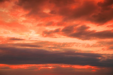 Image of Beautiful view of orange sky with clouds at sunset