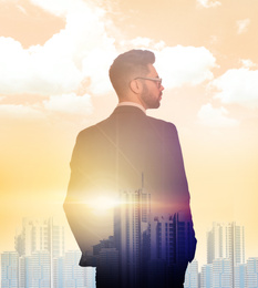 Image of Double exposure of businessman and cityscape on sunset