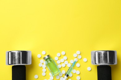 Photo of Different drugs and sports equipment on yellow background, flat lay with space for text. Doping control