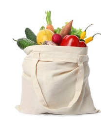 Cloth bag with vegetables on white background