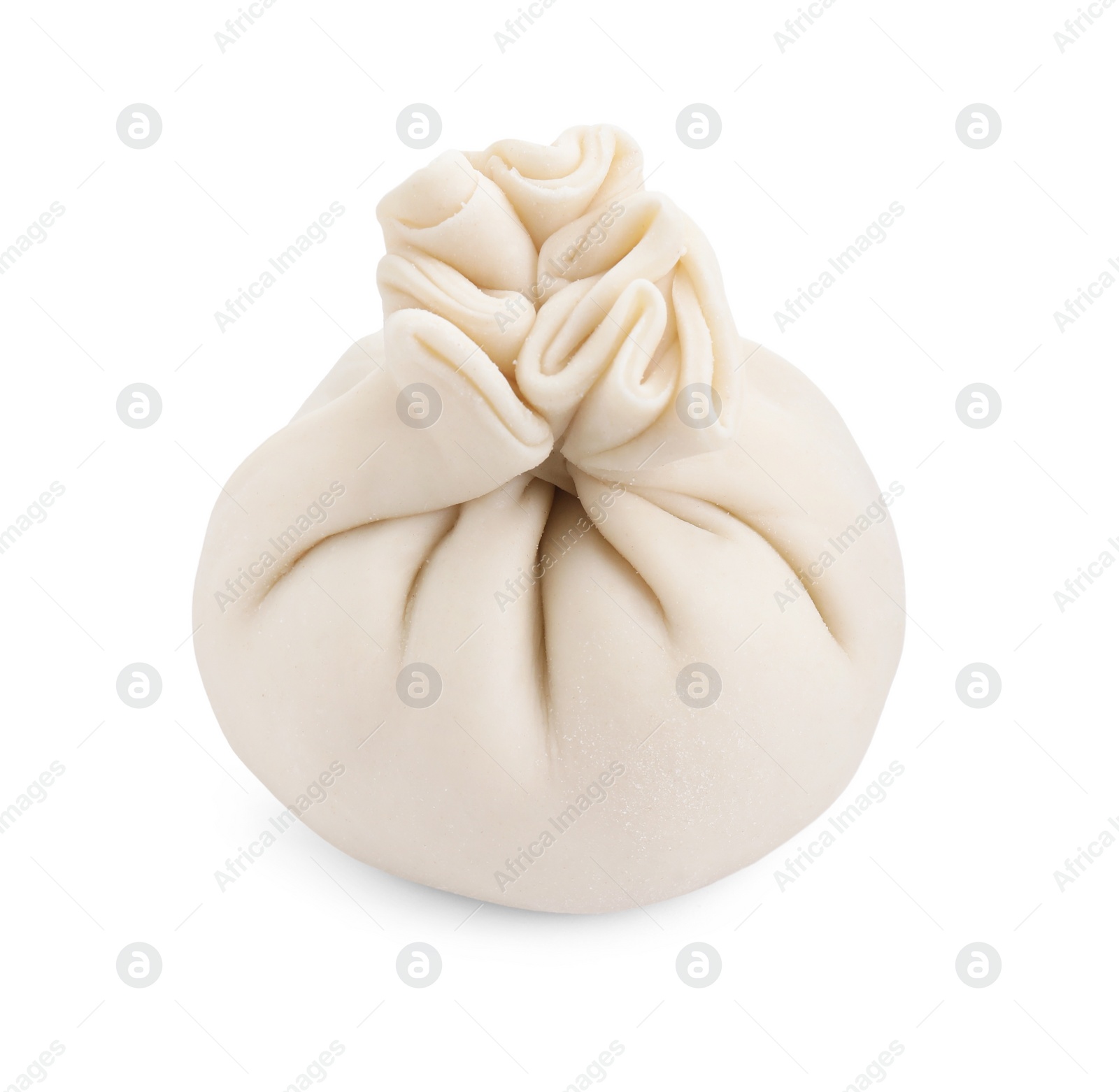 Photo of Uncooked khinkali (dumpling) isolated on white. Georgian cuisine