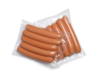 Photo of Packs of fresh raw sausages isolated on white, top view. Ingredients for hot dogs
