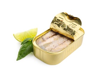 Open tin can with mackerel fillets, lime and basil on white background