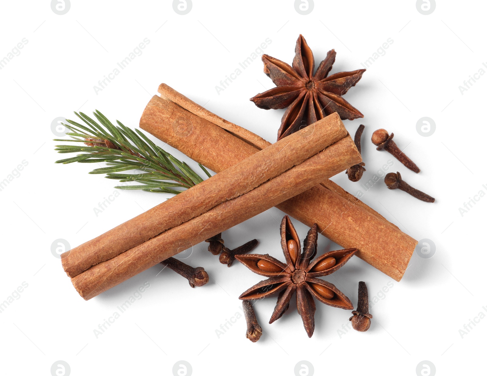 Photo of Different spices and fir branch on white background, top view