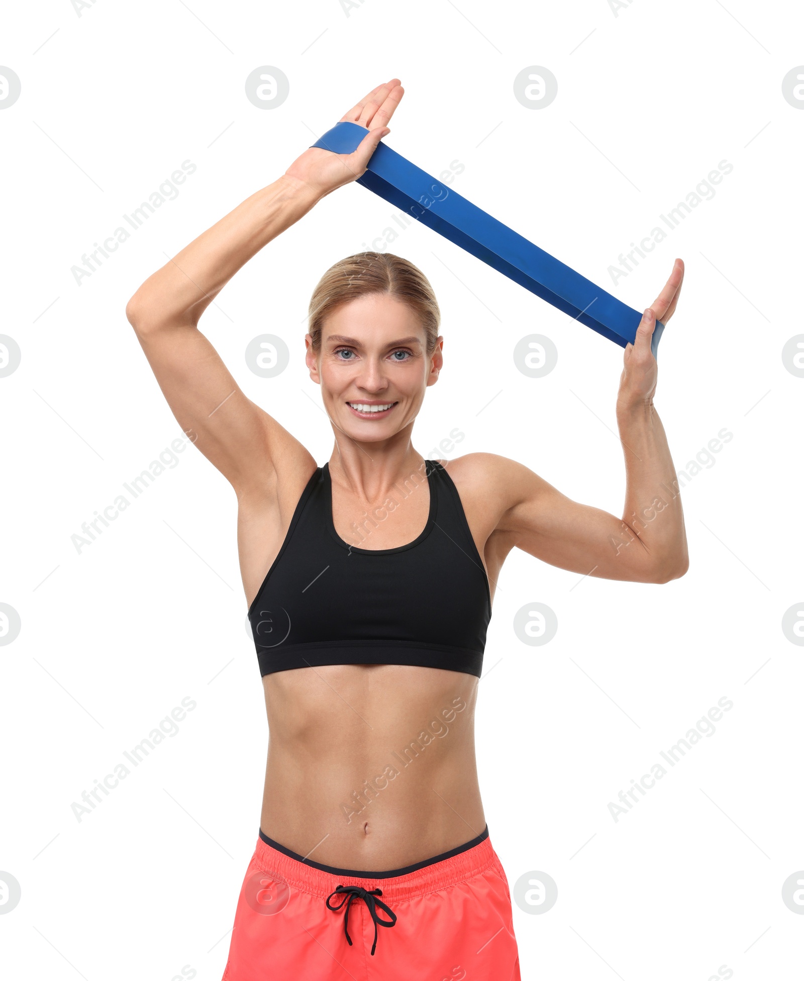 Photo of Woman exercising with elastic resistance band on white background