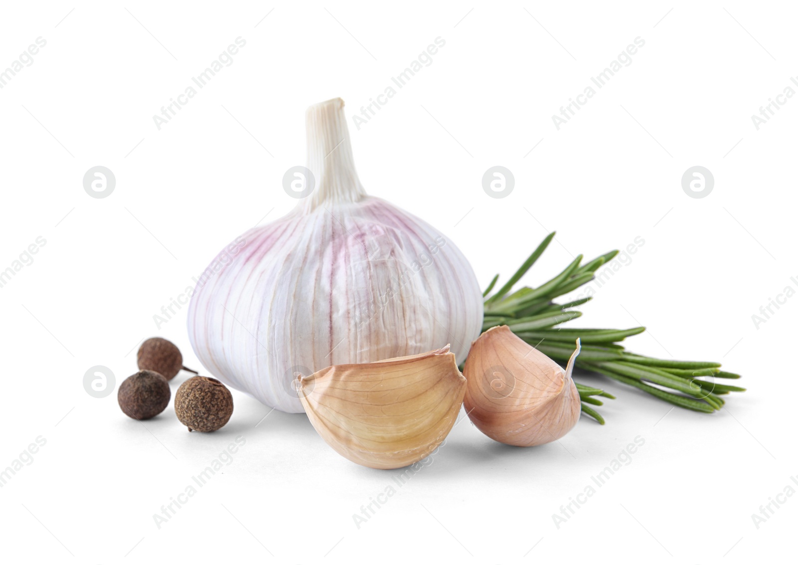 Photo of Fresh garlic, rosemary and allspice on white background