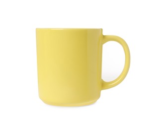 Photo of One yellow ceramic mug isolated on white