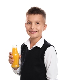 Happy boy holding bottle of juice on white background