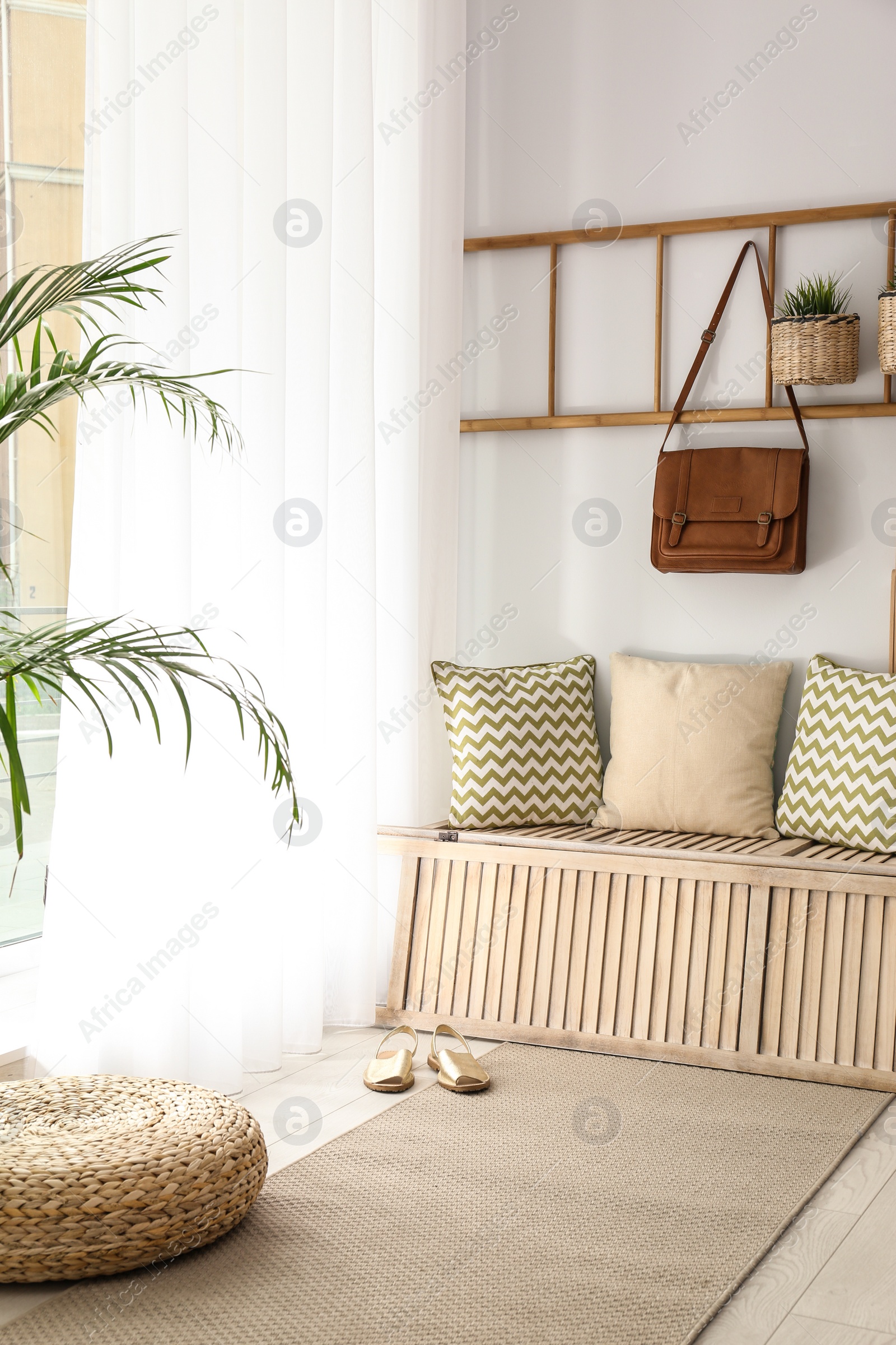 Photo of Cozy hallway interior with new stylish furniture