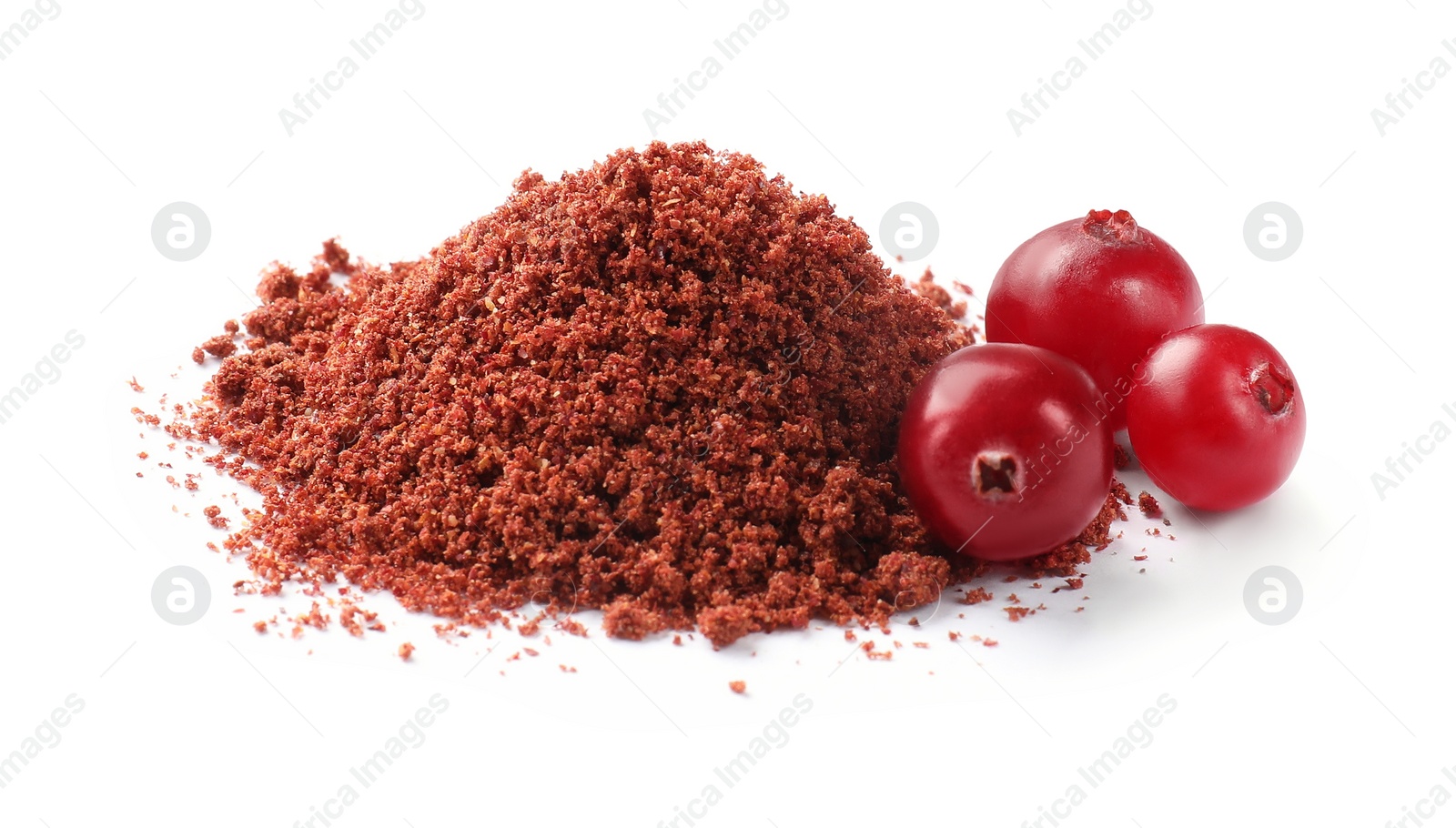 Photo of Dried cranberry powder and fresh berries isolated on white