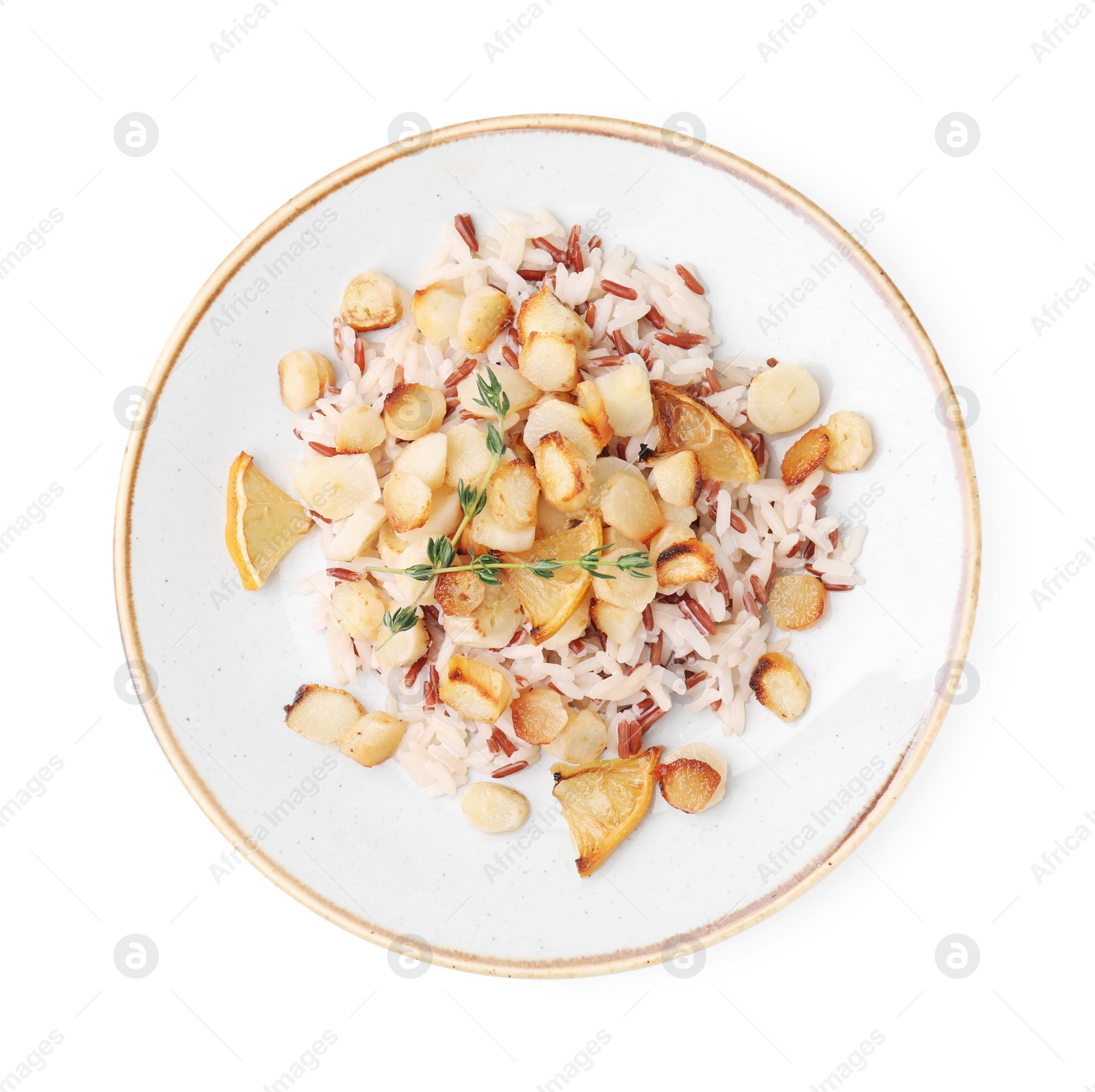 Photo of Plate with baked salsify roots, lemon and rice isolated on white, top view