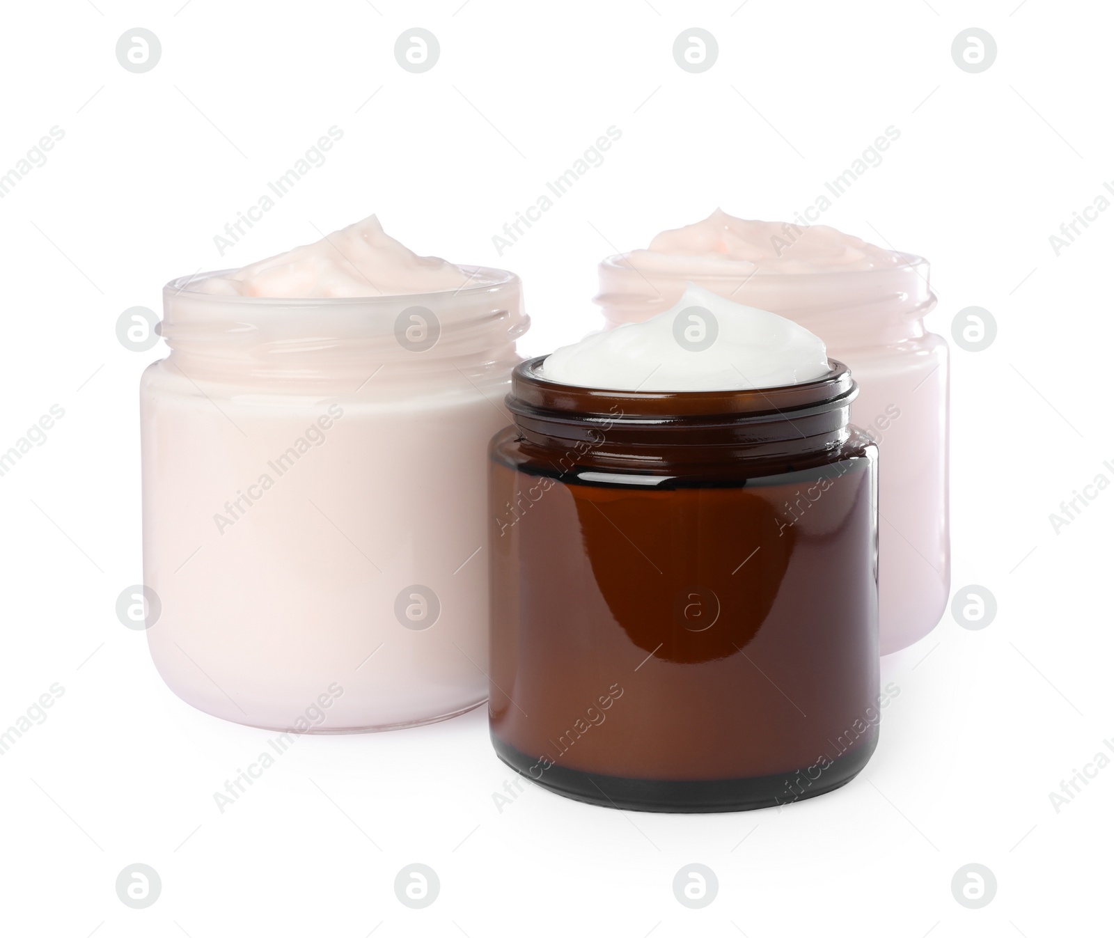 Photo of Jars of face cream isolated on white