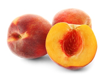 Photo of Fresh sweet peaches on white background