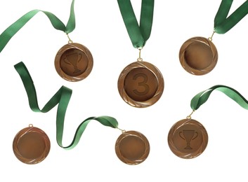 Bronze medals with ribbons isolated on white, set
