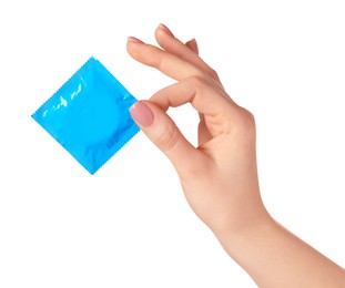 Photo of Woman holding condom on white background, closeup