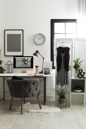 Photo of Stylish workplace with modern computer on desk