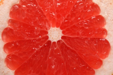 Photo of Texture of fresh ripe grapefruit, closeup view