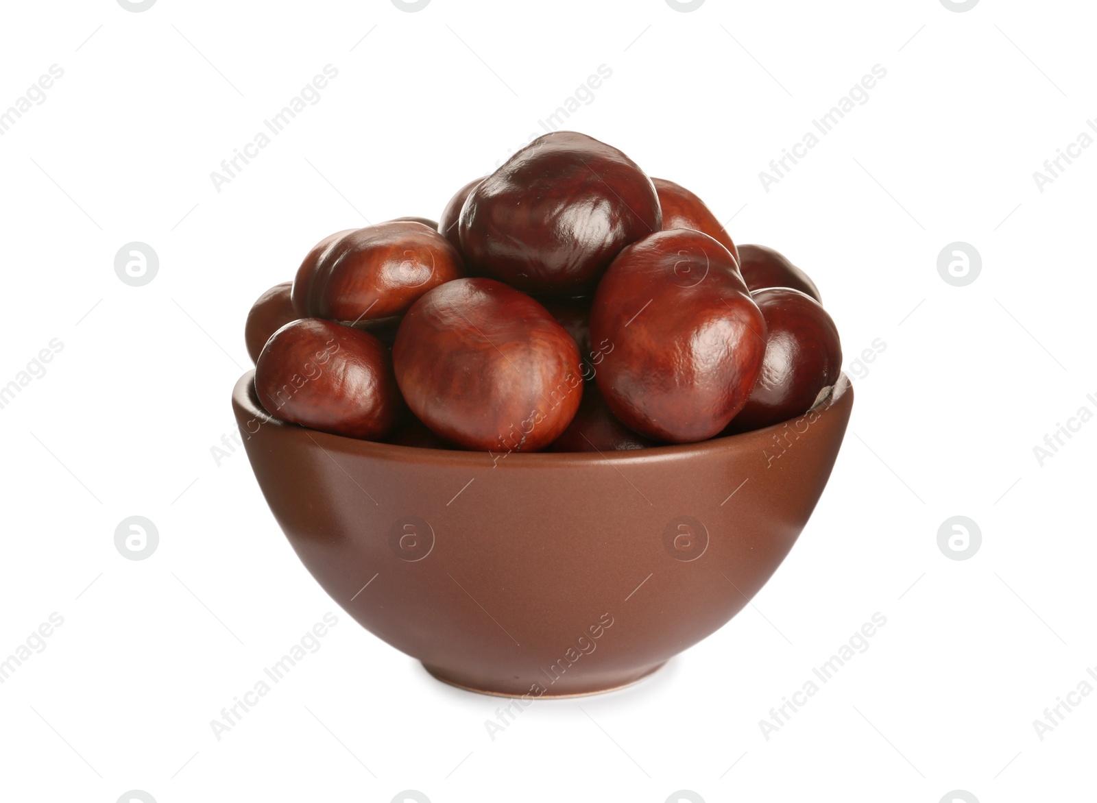 Photo of Horse chestnuts in bowl on white background