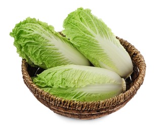 Photo of Fresh tasty Chinese cabbages in wicker basket on white background