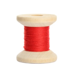Photo of Wooden spool of red sewing thread isolated on white