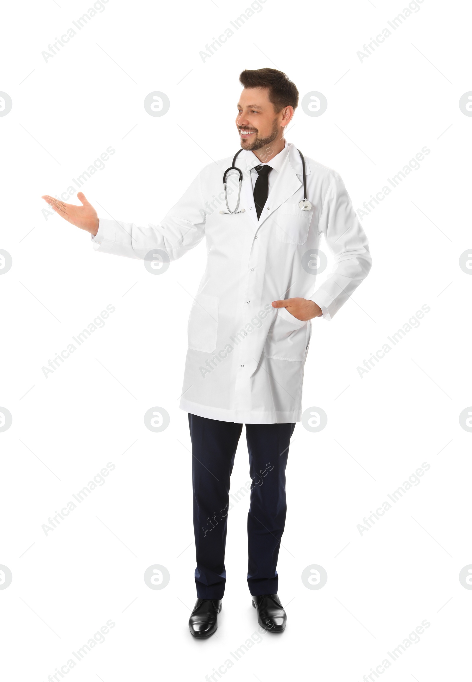 Photo of Full length portrait of male doctor isolated on white. Medical staff