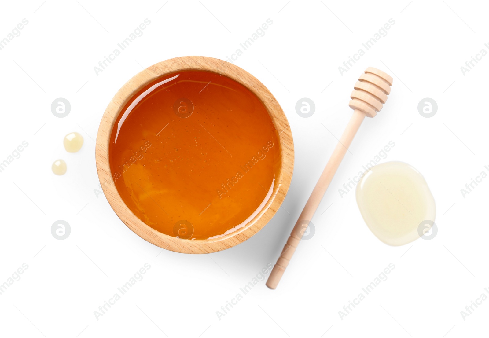 Photo of Tasty honey in bowl and dipper isolated on white, top view