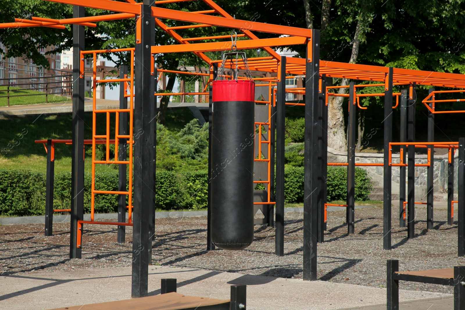 Photo of Empty outdoor gym with exercise equipment in park