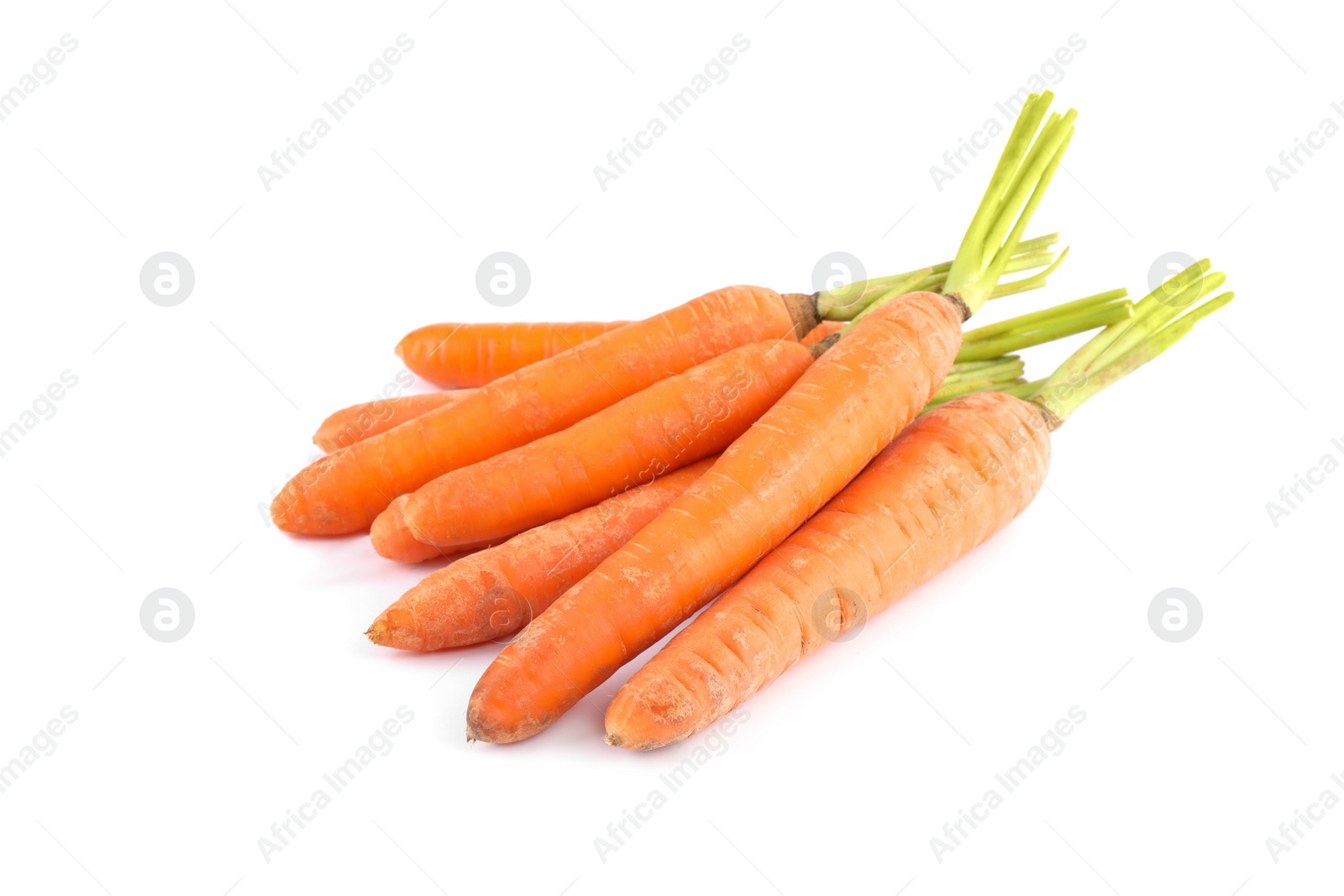 Bunch of fresh ripe carrots isolated on white Photo of Bunch of fresh ripe carrots isolated on white
