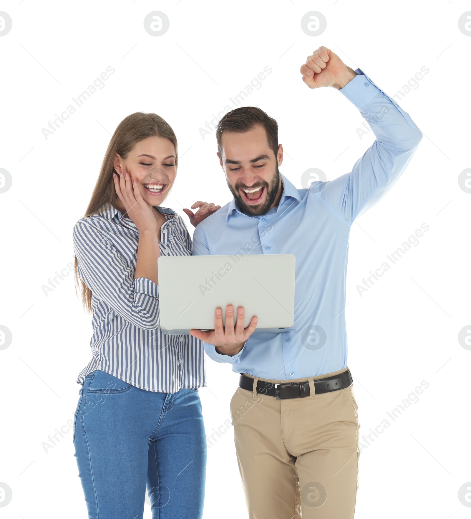 Photo of Emotional young people with laptop celebrating victory on white background