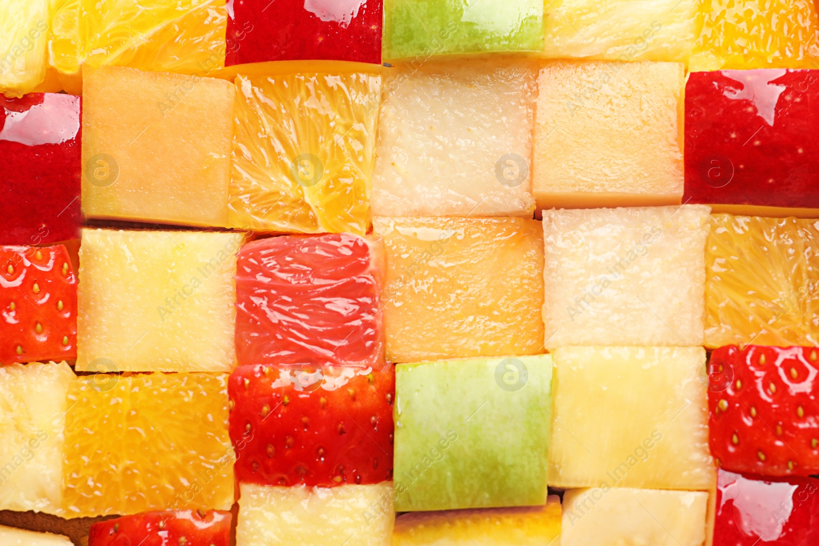 Photo of Fresh cut fruits as background