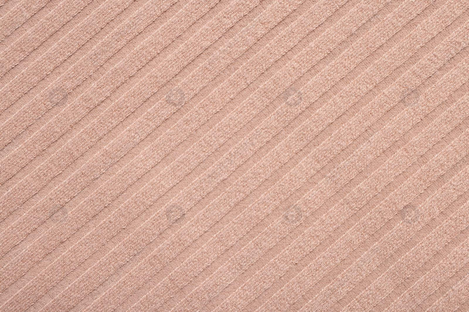 Photo of Texture of beige fabric as background, top view