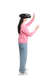Photo of Woman using virtual reality headset on white background