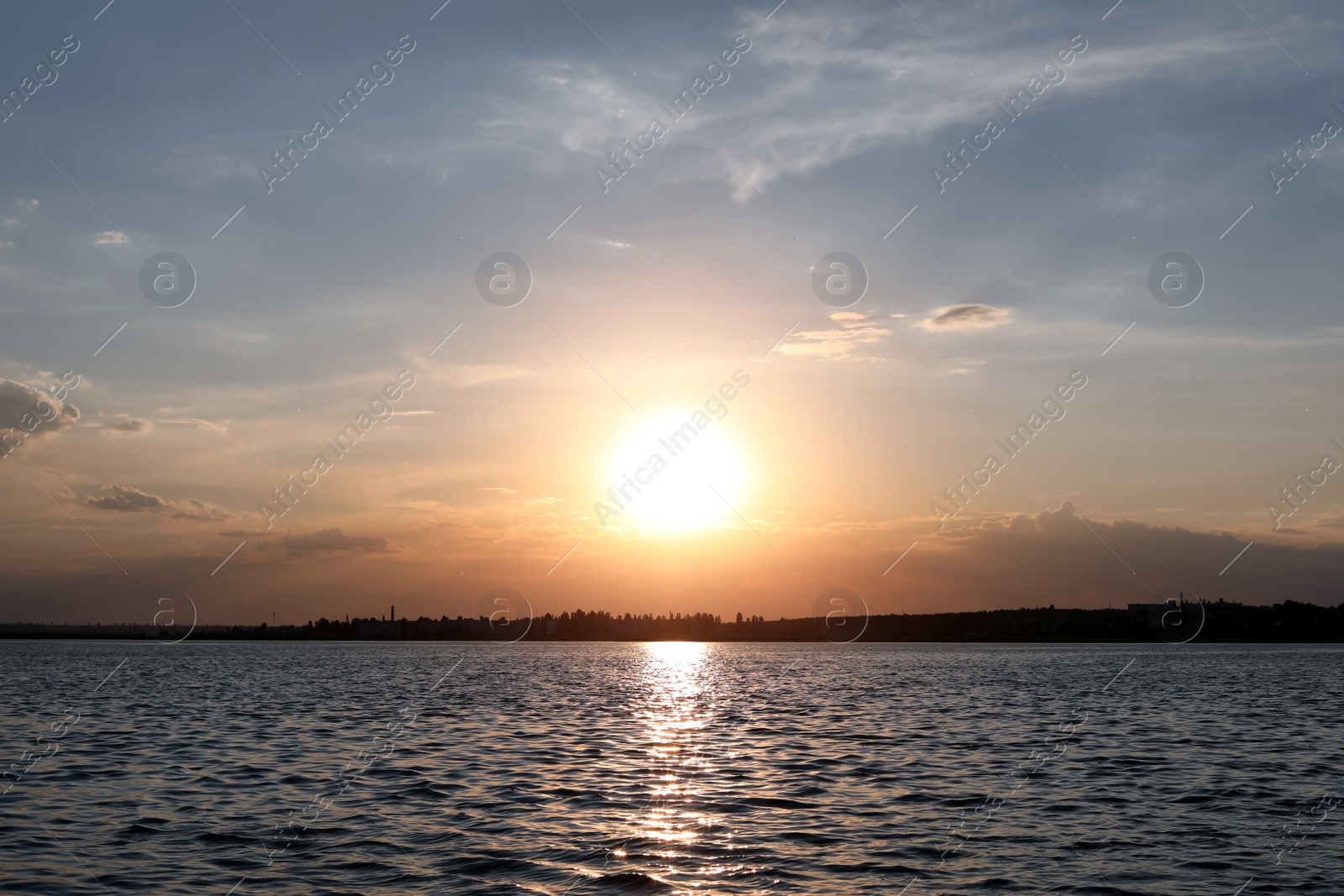 Photo of Picturesque view of beautiful sunrise on riverside. Morning sky