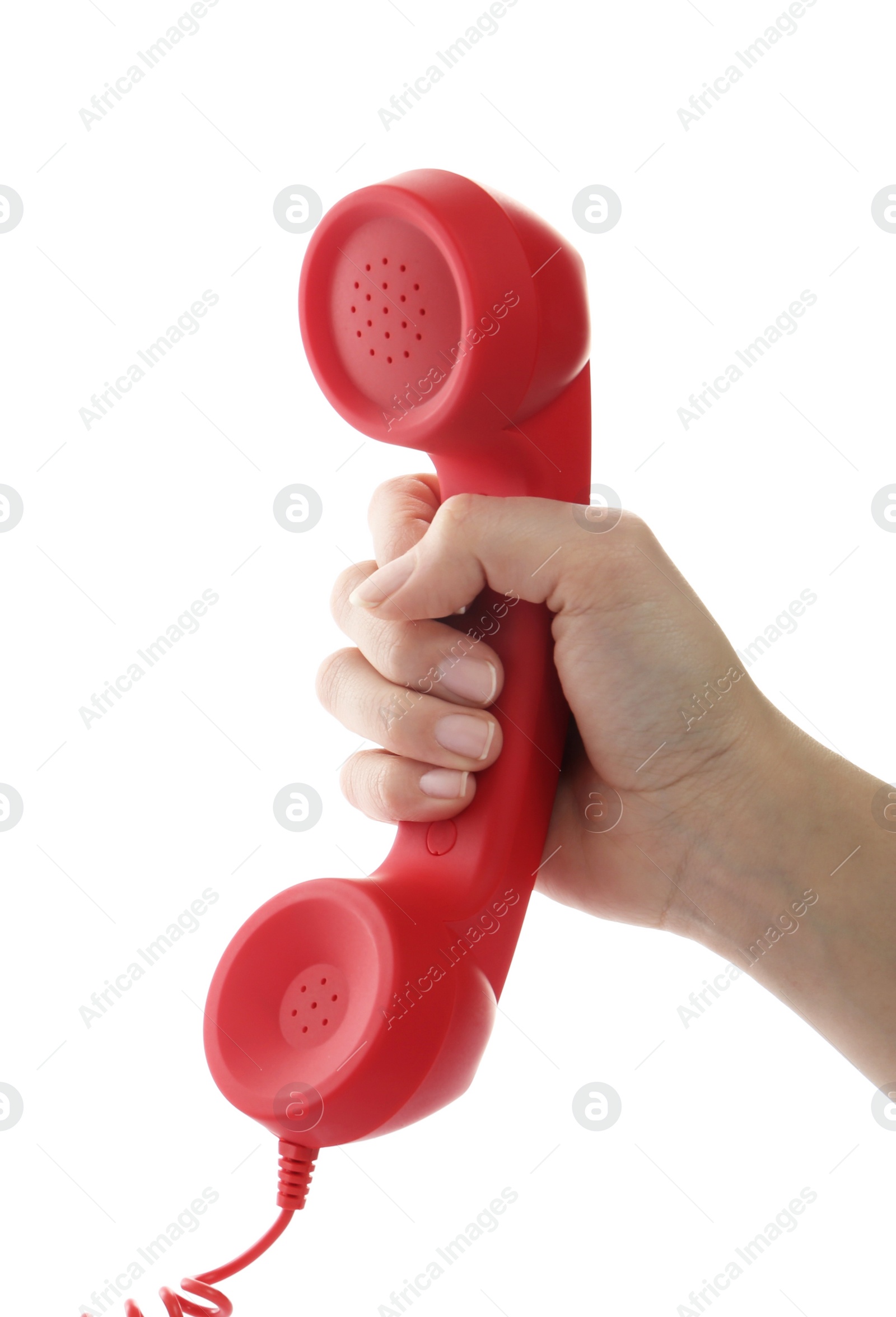 Photo of Woman holding red corded telephone handset on white background, closeup. Hotline concept