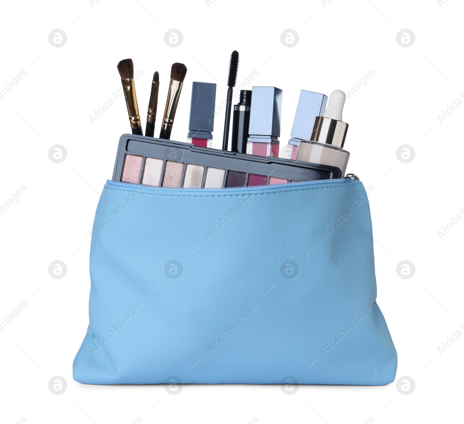 Photo of Different luxury decorative cosmetics and brushes in light blue case on white background