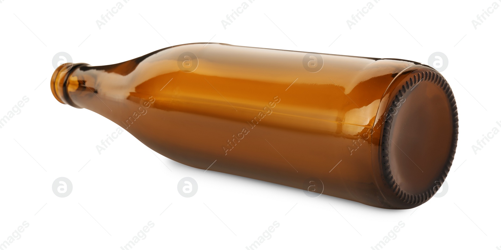 Photo of One empty brown beer bottle isolated on white