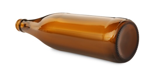 Photo of One empty brown beer bottle isolated on white