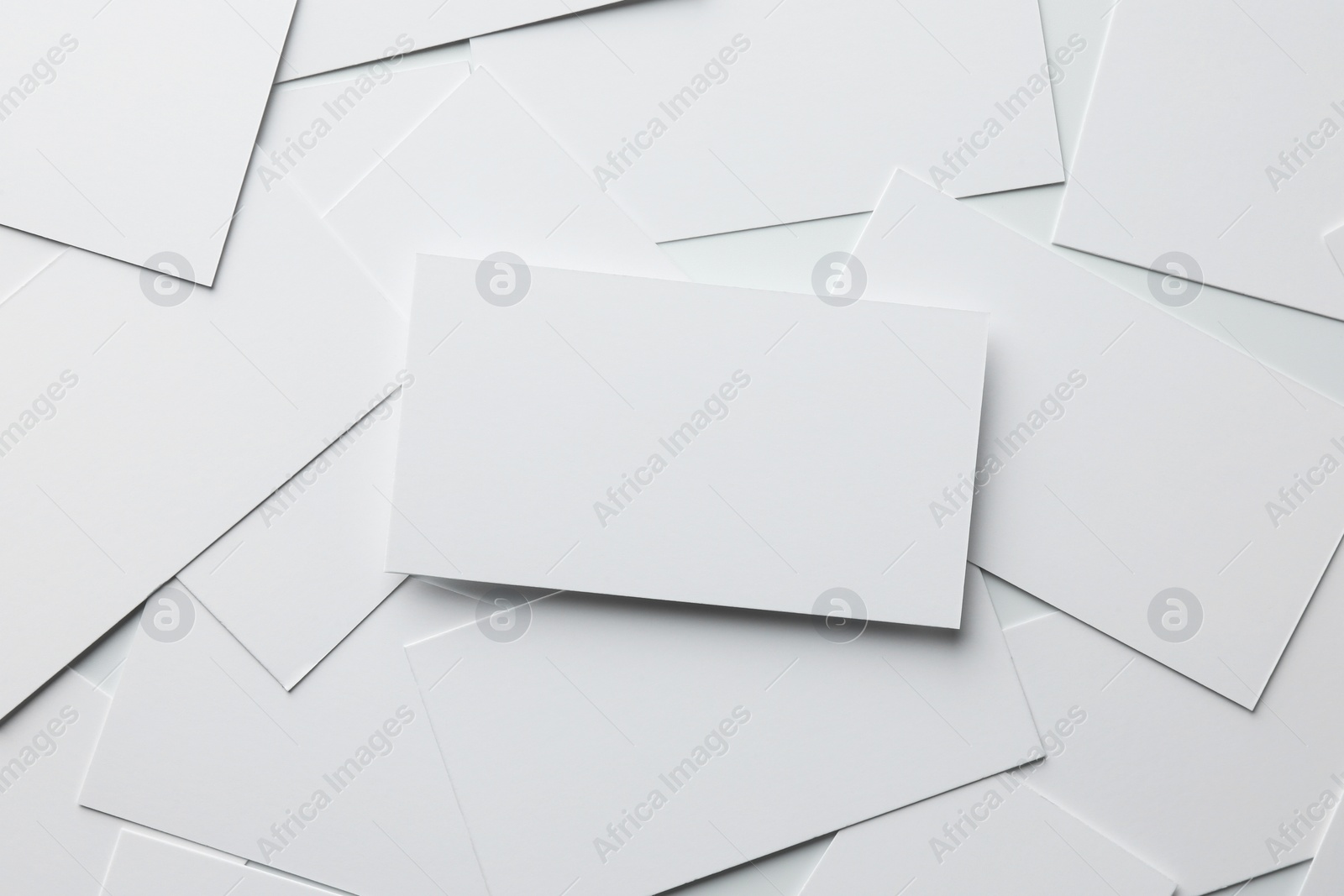 Photo of Blank business cards on white background, top view. Mockup for design