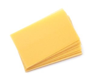 Photo of Stack of uncooked lasagna sheets isolated on white, top view