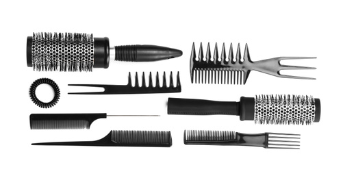 Set of modern hair combs and brushes isolated on white, top view