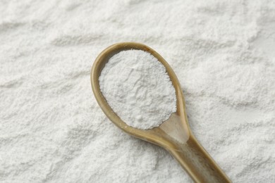 Photo of One spoon on baking powder, closeup view