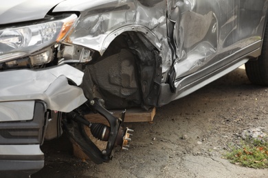 Broken car after road accident, closeup view. Auto insurance