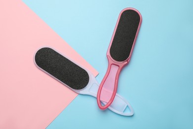 Photo of Foot files on color background, flat lay. Pedicure tools