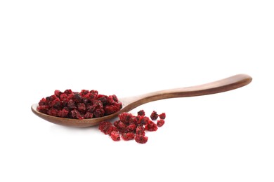 Photo of Dried red currants and wooden spoon on white background