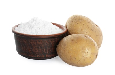 Photo of Bowl with starch and fresh potatoes on white background