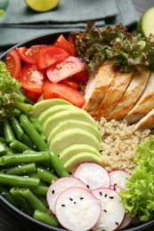 Photo of Healthy meal. Tasty products in bowl on table, closeup