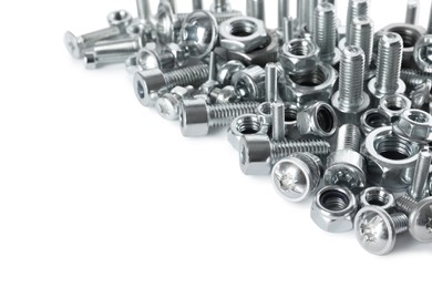 Photo of Different metal bolts and nuts on white background