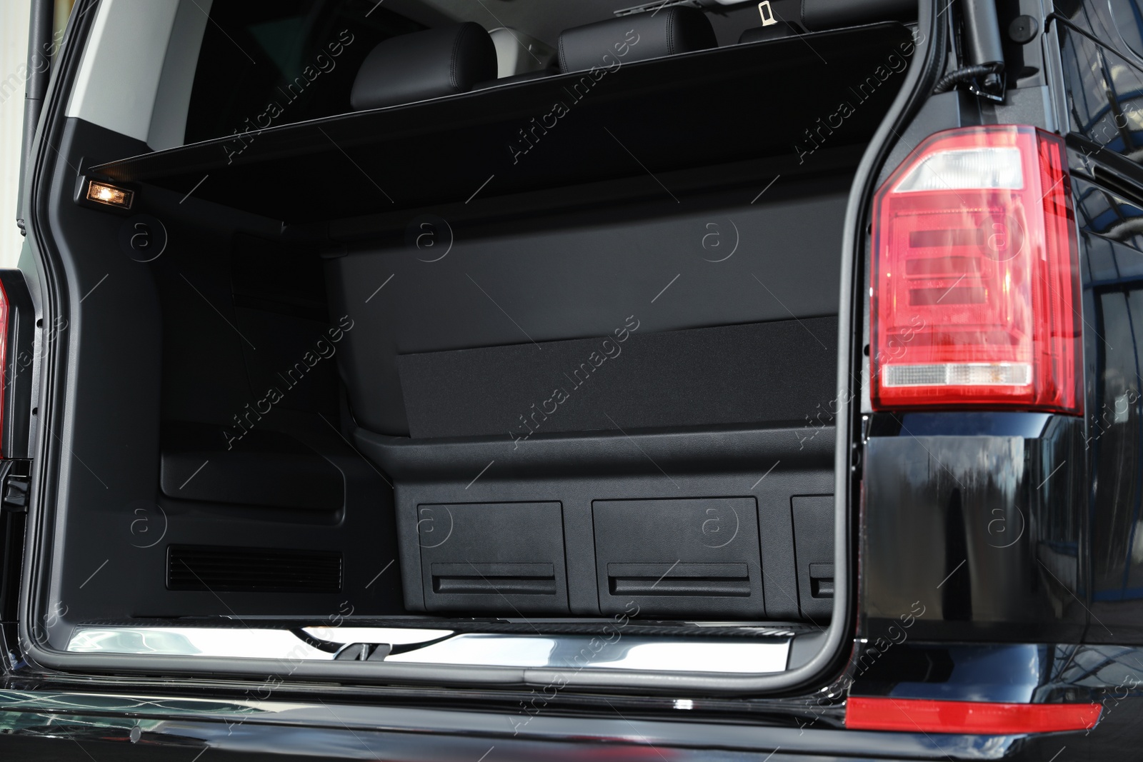 Photo of Open empty capacious trunk of modern car