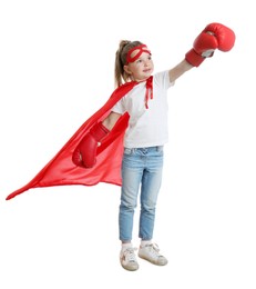 Photo of Little girl in superhero costume on white background